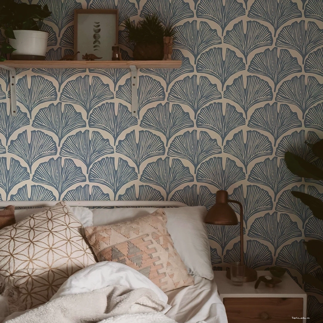 Apartment bedroom with waverly blue palm wallpaper